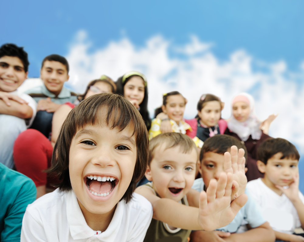 Crowd of children, different ages and races in front of the school, breaktime-1