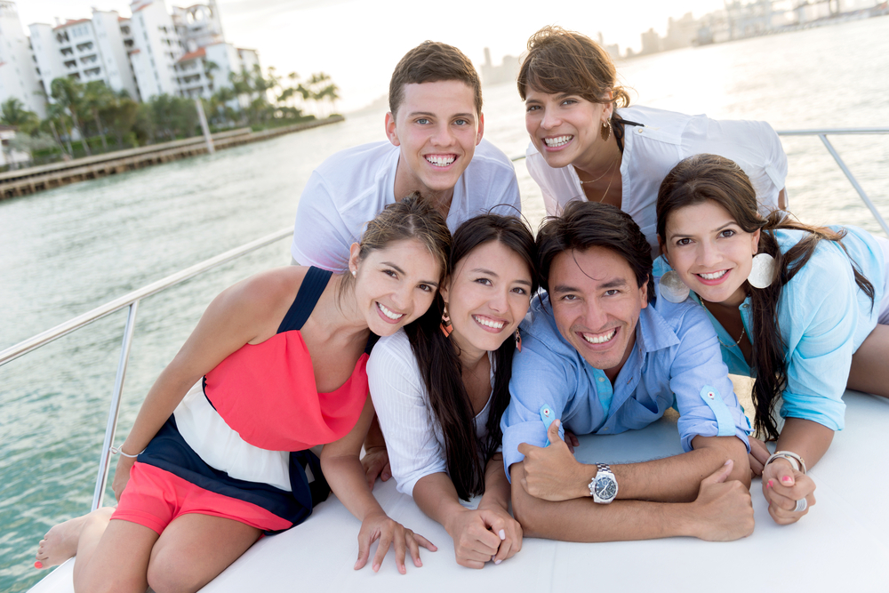 Group of people in a boat enjoying the summer